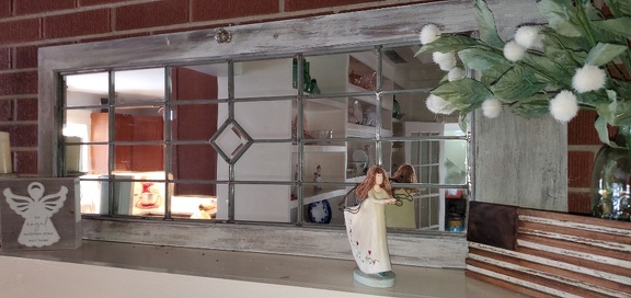 panel with mirror in repurposed antique cabinet door
